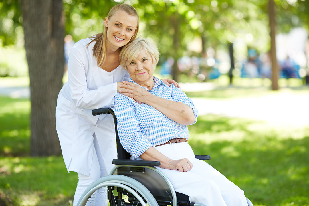 Elderly woman in wheelchair